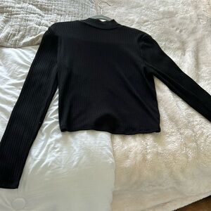 Turtleneck sweater with cut out back